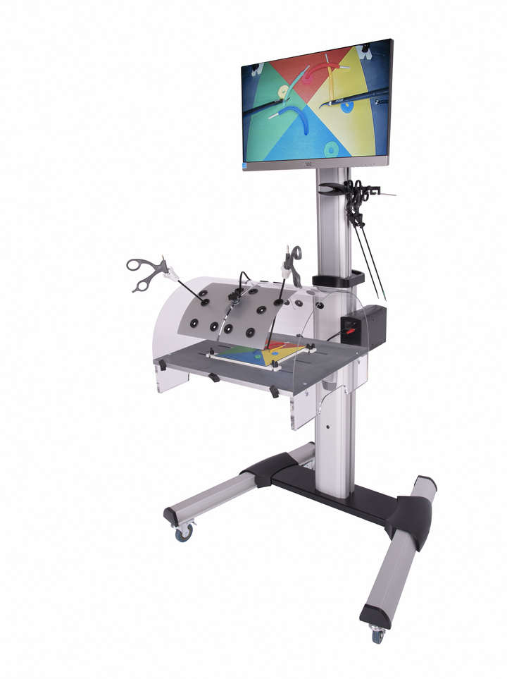 Laparoscopic training station with cylindrical top